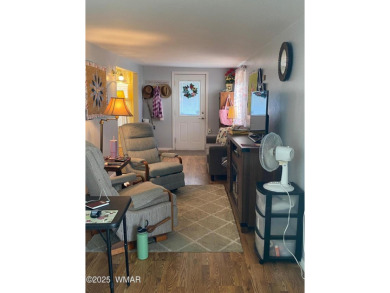 This cozy park model features 2 full bathrooms, a 40 gal hot on Juniper Ridge R.V. Golf Resort in Arizona - for sale on GolfHomes.com, golf home, golf lot