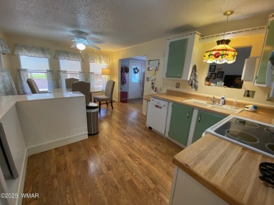 This cozy park model features 2 full bathrooms, a 40 gal hot on Juniper Ridge R.V. Golf Resort in Arizona - for sale on GolfHomes.com, golf home, golf lot