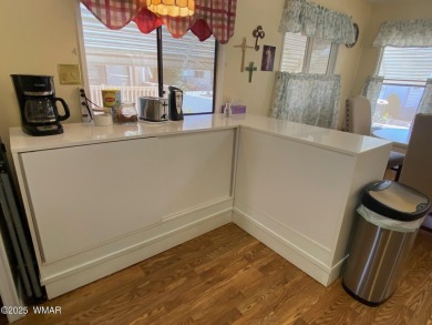 This cozy park model features 2 full bathrooms, a 40 gal hot on Juniper Ridge R.V. Golf Resort in Arizona - for sale on GolfHomes.com, golf home, golf lot