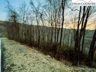 This buildable third acre lot is located close to Buckeye Lake on Beech Mountain Club in North Carolina - for sale on GolfHomes.com, golf home, golf lot