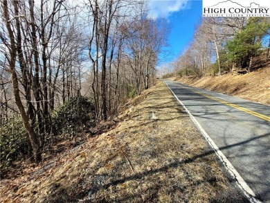 This buildable third acre lot is located close to Buckeye Lake on Beech Mountain Club in North Carolina - for sale on GolfHomes.com, golf home, golf lot