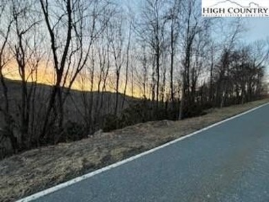 This buildable third acre lot is located close to Buckeye Lake on Beech Mountain Club in North Carolina - for sale on GolfHomes.com, golf home, golf lot
