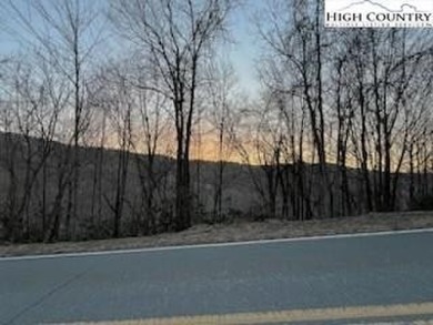 This buildable third acre lot is located close to Buckeye Lake on Beech Mountain Club in North Carolina - for sale on GolfHomes.com, golf home, golf lot