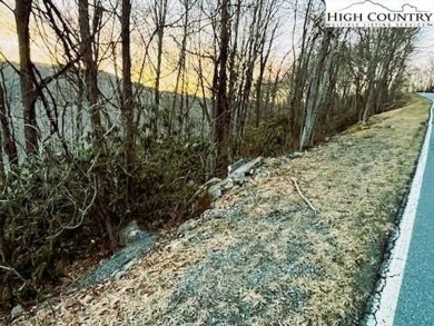 This buildable third acre lot is located close to Buckeye Lake on Beech Mountain Club in North Carolina - for sale on GolfHomes.com, golf home, golf lot