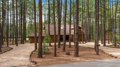 Set on a beautiful 0.52-acre lot surrounded by towering pines on Pinetop Lakes Country Club in Arizona - for sale on GolfHomes.com, golf home, golf lot