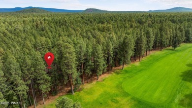 Set on a beautiful 0.52-acre lot surrounded by towering pines on Pinetop Lakes Country Club in Arizona - for sale on GolfHomes.com, golf home, golf lot