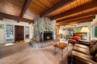 Set on a beautiful 0.52-acre lot surrounded by towering pines on Pinetop Lakes Country Club in Arizona - for sale on GolfHomes.com, golf home, golf lot