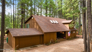 Set on a beautiful 0.52-acre lot surrounded by towering pines on Pinetop Lakes Country Club in Arizona - for sale on GolfHomes.com, golf home, golf lot