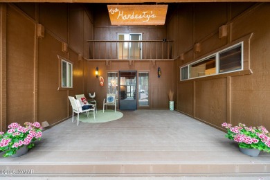 Set on a beautiful 0.52-acre lot surrounded by towering pines on Pinetop Lakes Country Club in Arizona - for sale on GolfHomes.com, golf home, golf lot