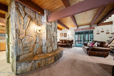 Set on a beautiful 0.52-acre lot surrounded by towering pines on Pinetop Lakes Country Club in Arizona - for sale on GolfHomes.com, golf home, golf lot