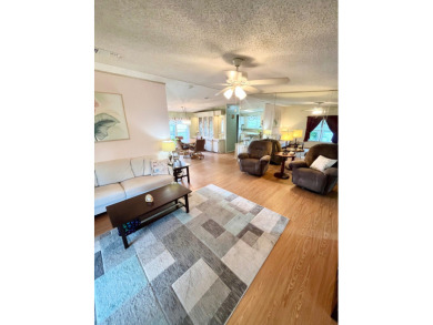 If you're looking for a move-in ready home with exceptional on Pine Lakes Country Club in Florida - for sale on GolfHomes.com, golf home, golf lot