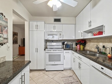 This bright and spacious condo features an open living/dining on Fountains Golf and Country Club in Florida - for sale on GolfHomes.com, golf home, golf lot