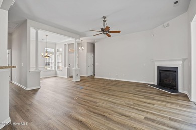 Welcome to easy living in this beautifully maintained home on Sandpiper Bay Golf and Country Club in North Carolina - for sale on GolfHomes.com, golf home, golf lot