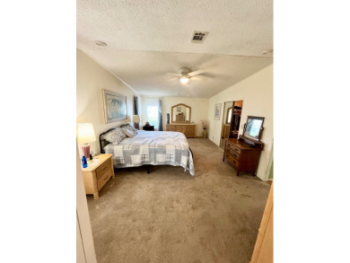 If you're looking for a move-in ready home with exceptional on Pine Lakes Country Club in Florida - for sale on GolfHomes.com, golf home, golf lot