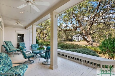 From stunning curb appeal to breathtaking views across 2 lagoons on The Landings Club - Palmetto in Georgia - for sale on GolfHomes.com, golf home, golf lot