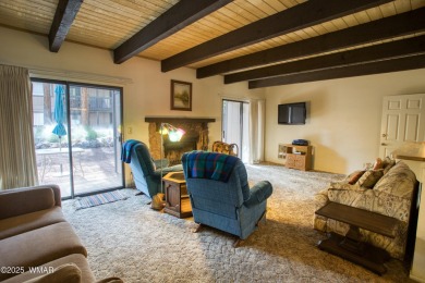 Welcome to this charming lower-level condo in the desirable on Pinetop Lakes Golf and Country Club in Arizona - for sale on GolfHomes.com, golf home, golf lot