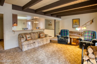 Welcome to this charming lower-level condo in the desirable on Pinetop Lakes Golf and Country Club in Arizona - for sale on GolfHomes.com, golf home, golf lot