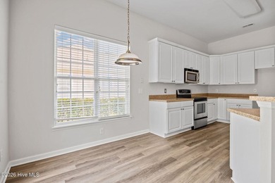 Welcome to easy living in this beautifully maintained home on Sandpiper Bay Golf and Country Club in North Carolina - for sale on GolfHomes.com, golf home, golf lot