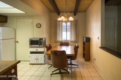 Welcome to this charming lower-level condo in the desirable on Pinetop Lakes Golf and Country Club in Arizona - for sale on GolfHomes.com, golf home, golf lot