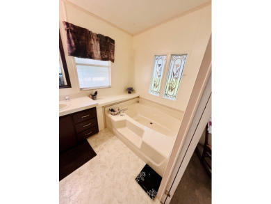If you're looking for a move-in ready home with exceptional on Pine Lakes Country Club in Florida - for sale on GolfHomes.com, golf home, golf lot