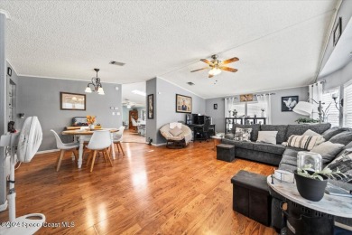 Charming 2-Bedroom Home with Golf Course Views! This on Barefoot Bay Golf Course in Florida - for sale on GolfHomes.com, golf home, golf lot