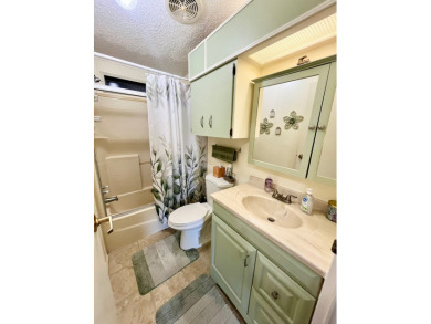 If you're looking for a move-in ready home with exceptional on Pine Lakes Country Club in Florida - for sale on GolfHomes.com, golf home, golf lot