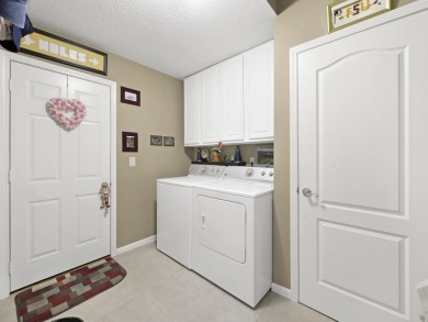 Your Peaceful And Tranquil Cul-de-sac Home Awaits In The on Marsh Creek Country Club in Florida - for sale on GolfHomes.com, golf home, golf lot