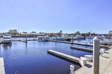 Welcome to 5825 Catalina Dr #433 - a beautiful 2-bedroom on Barefoot Resort and Golf Club  in South Carolina - for sale on GolfHomes.com, golf home, golf lot