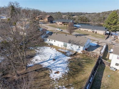 Welcome to this beautifully updated home, conveniently located on Cedars Country Club in Arkansas - for sale on GolfHomes.com, golf home, golf lot