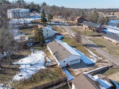 Welcome to this beautifully updated home, conveniently located on Cedars Country Club in Arkansas - for sale on GolfHomes.com, golf home, golf lot