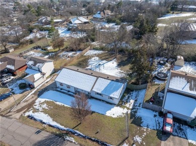 Welcome to this beautifully updated home, conveniently located on Cedars Country Club in Arkansas - for sale on GolfHomes.com, golf home, golf lot