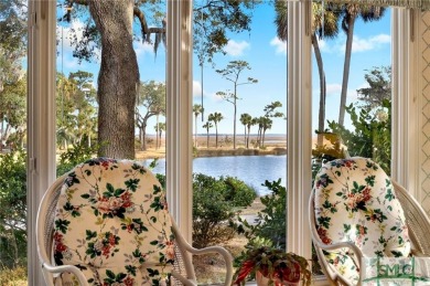 From stunning curb appeal to breathtaking views across 2 lagoons on The Landings Club - Palmetto in Georgia - for sale on GolfHomes.com, golf home, golf lot