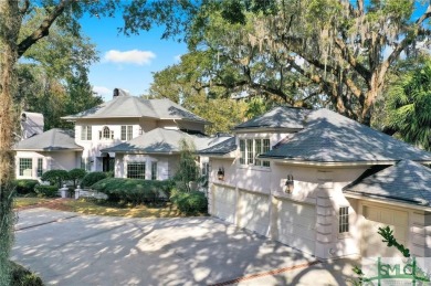 From stunning curb appeal to breathtaking views across 2 lagoons on The Landings Club - Palmetto in Georgia - for sale on GolfHomes.com, golf home, golf lot