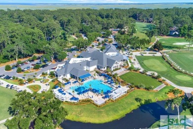 From stunning curb appeal to breathtaking views across 2 lagoons on The Landings Club - Palmetto in Georgia - for sale on GolfHomes.com, golf home, golf lot