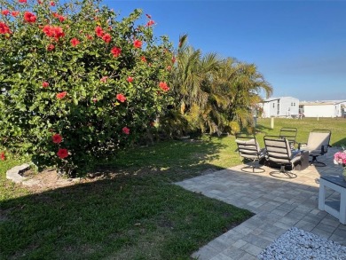 This stunning home, showcasing premium upgrades, is a on Palm Hill Golf Club in Florida - for sale on GolfHomes.com, golf home, golf lot