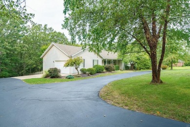 Impressive ranch home with circle drive & large lot in Forest on Oak Meadow Country Club in Missouri - for sale on GolfHomes.com, golf home, golf lot