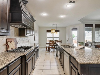 Welcome to this stunning 4-bed, 3.5-bath home with a spacious on Trophy Club of Dallas in Texas - for sale on GolfHomes.com, golf home, golf lot