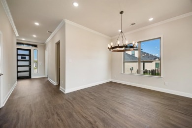 This desirable two-story Altura Callington floorplan is now on Heath Golf and Yacht Club in Texas - for sale on GolfHomes.com, golf home, golf lot