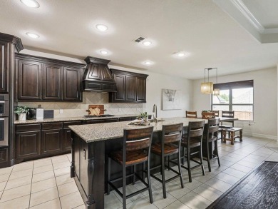 Welcome to this stunning 4-bed, 3.5-bath home with a spacious on Trophy Club of Dallas in Texas - for sale on GolfHomes.com, golf home, golf lot
