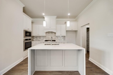 This desirable two-story Altura Callington floorplan is now on Heath Golf and Yacht Club in Texas - for sale on GolfHomes.com, golf home, golf lot
