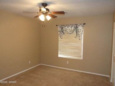 Wonderful location for this charming home. Sits on 1.35 acres on Snowflake Municipal Golf Course in Arizona - for sale on GolfHomes.com, golf home, golf lot