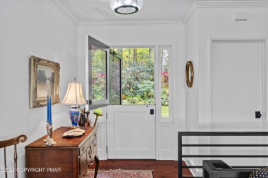 This exquisite mid-century ranch home offers stunning on Buck Hill Golf Club  in Pennsylvania - for sale on GolfHomes.com, golf home, golf lot