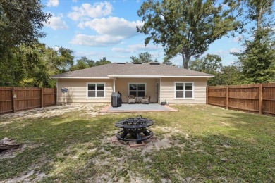 Quiet Community living in this 3 BD/2 BA home with 2-car garage on Chiefland Golf and Country Club in Florida - for sale on GolfHomes.com, golf home, golf lot