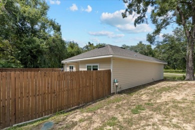 Quiet Community living in this 3 BD/2 BA home with 2-car garage on Chiefland Golf and Country Club in Florida - for sale on GolfHomes.com, golf home, golf lot