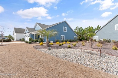 Coastal charm meets effortless living in this beautifully on Members Club At St. James Plantation in North Carolina - for sale on GolfHomes.com, golf home, golf lot