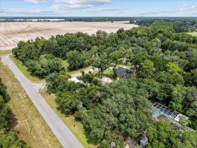 Quiet Community living in this 3 BD/2 BA home with 2-car garage on Chiefland Golf and Country Club in Florida - for sale on GolfHomes.com, golf home, golf lot