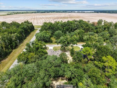 Quiet Community living in this 3 BD/2 BA home with 2-car garage on Chiefland Golf and Country Club in Florida - for sale on GolfHomes.com, golf home, golf lot