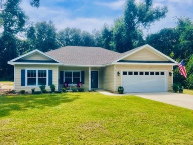 Quiet Community living in this 3 BD/2 BA home with 2-car garage on Chiefland Golf and Country Club in Florida - for sale on GolfHomes.com, golf home, golf lot
