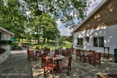 This exquisite mid-century ranch combines timeless design with on Buck Hill Golf Club  in Pennsylvania - for sale on GolfHomes.com, golf home, golf lot