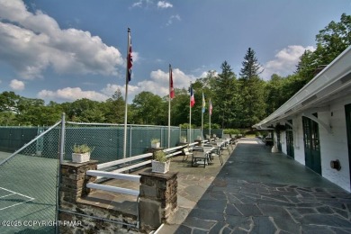 This exquisite mid-century ranch combines timeless design with on Buck Hill Golf Club  in Pennsylvania - for sale on GolfHomes.com, golf home, golf lot